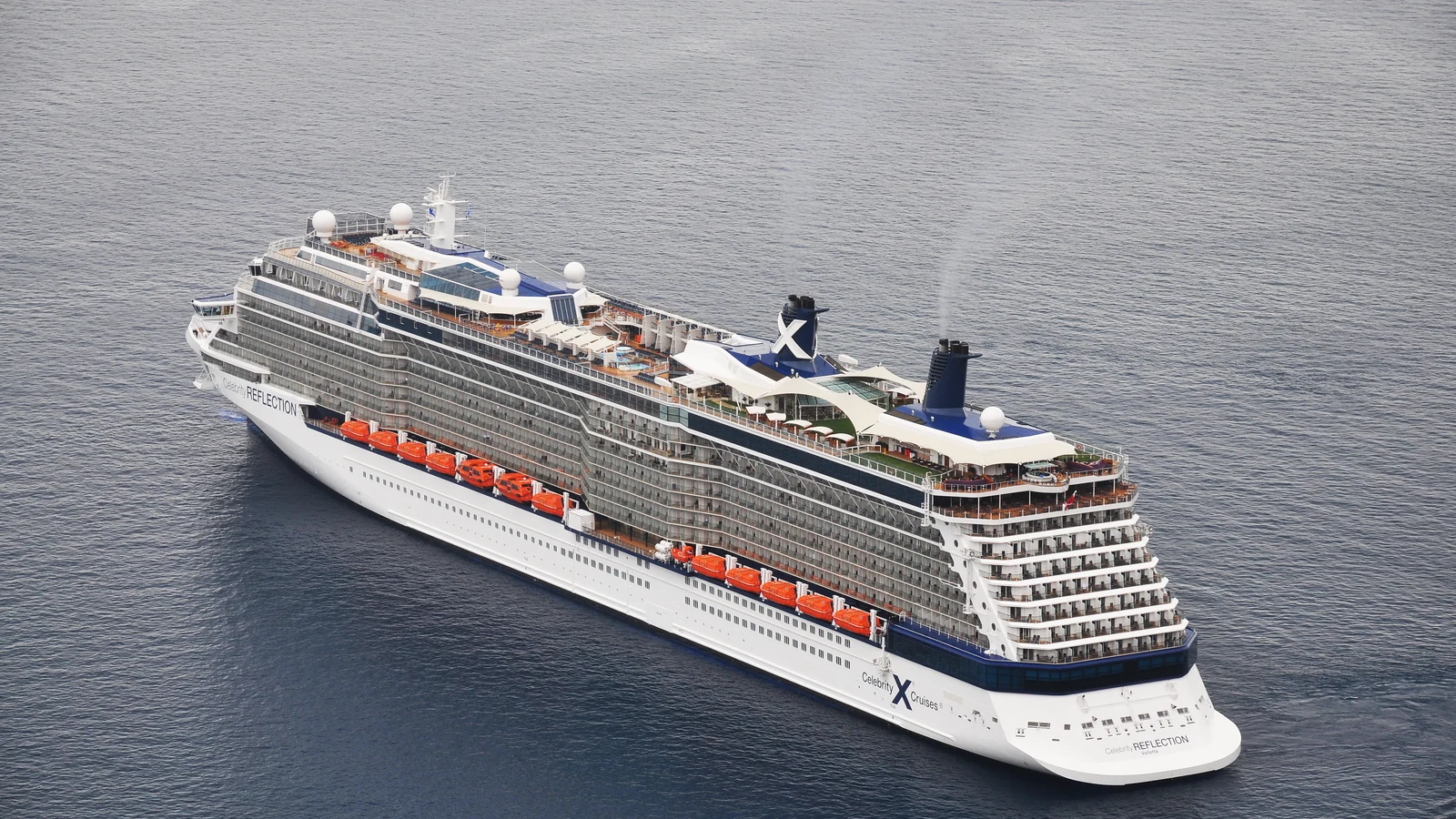 Celebrity Reflection cruise ship near Santorini Greece