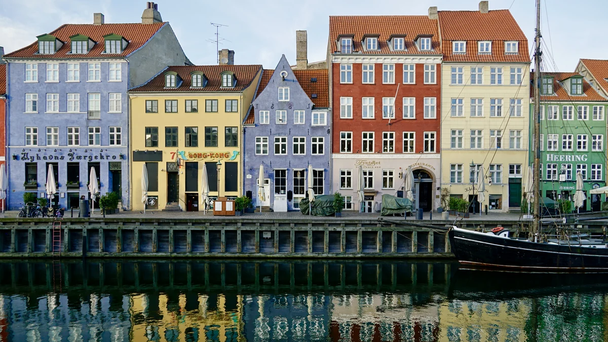 Copenhagen cruise port guide illustrated with colourful Nyhavn waterfront houses