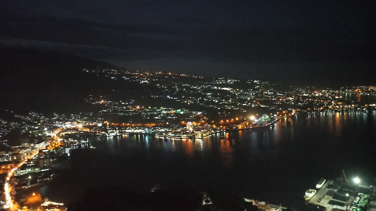 Jayapura city, harbour and surrounding green hills in Papua, Indonesia