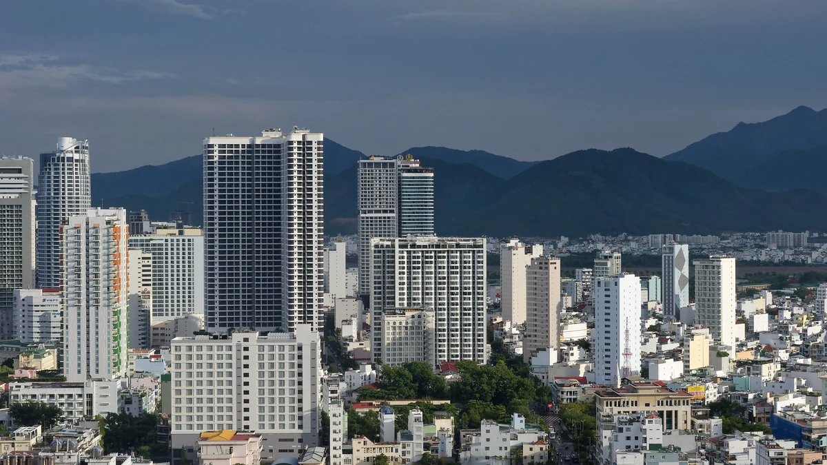 Nha Trang city skyline with green mountains behind it in Vietnam