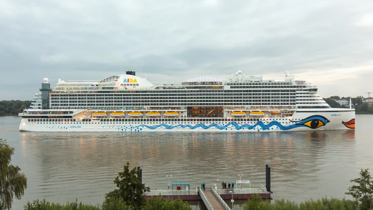 AIDAprima cruise ship sailing past Hamburg