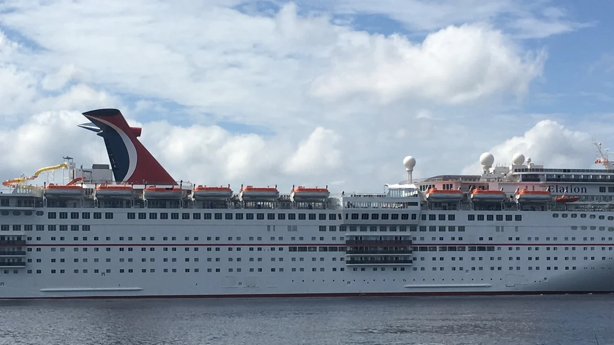 Carnival Elation cruise ship arriving in Jacksonville before its current hull livery