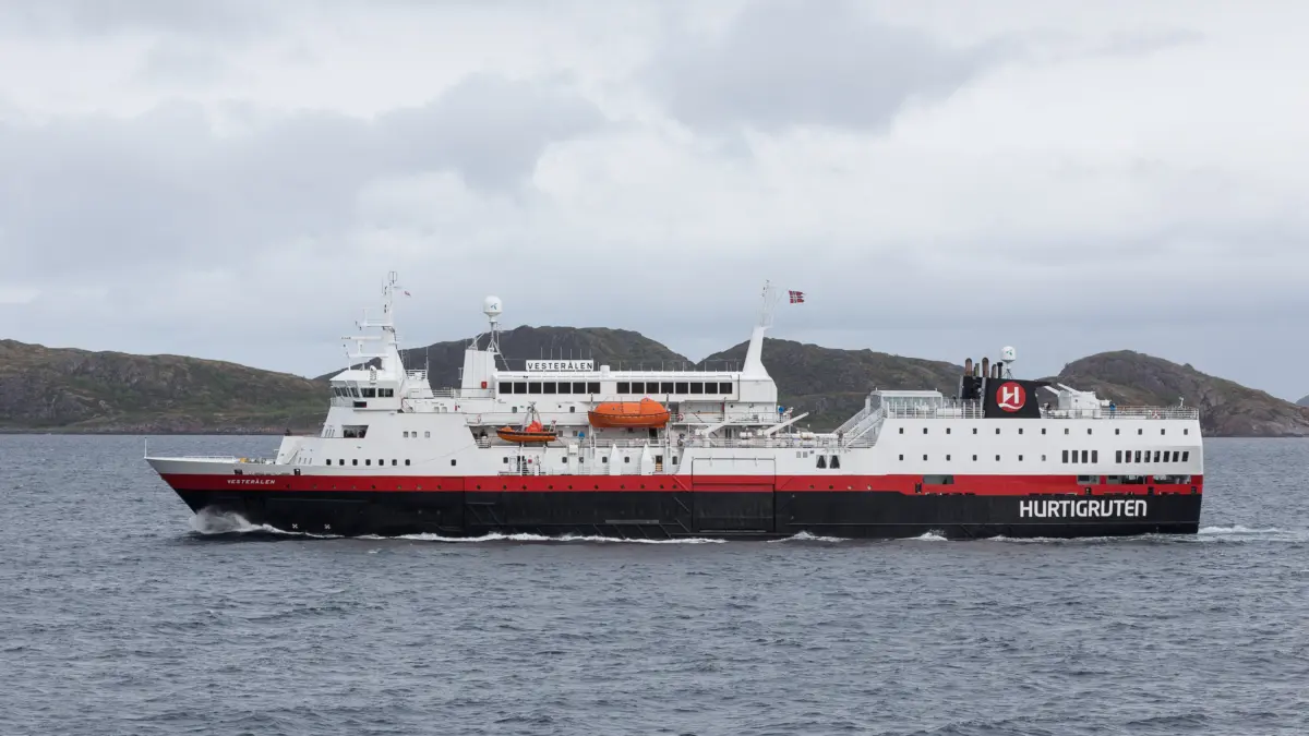 MS Vesteralen Hurtigruten ship sailing by Amnoya Norway
